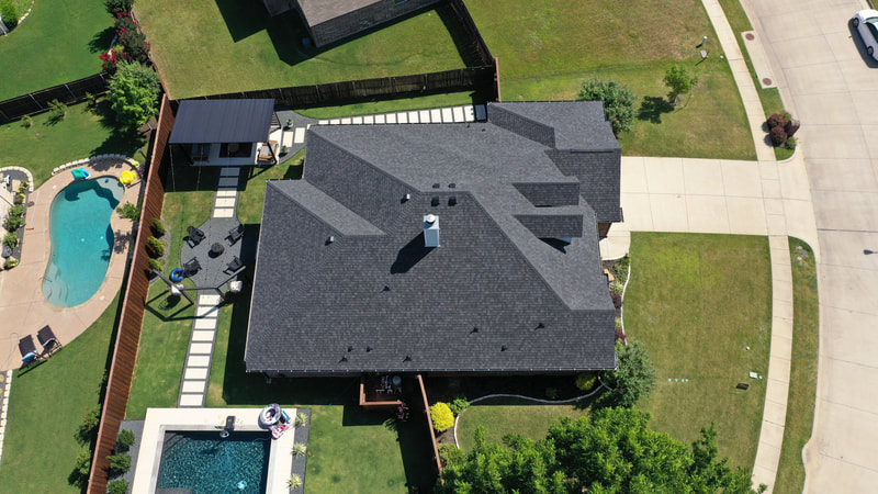 Aerial view of a completed residential roof
