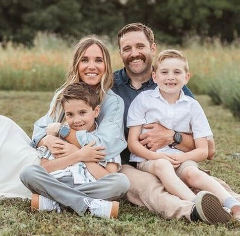 Brandon Taylor, 3rd Day Roofing owner, with his wife Courtney and their two sons